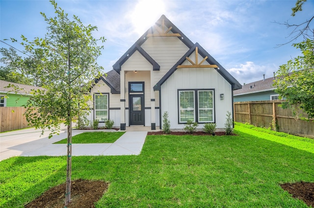 8714 Clarington St, Houston, TX 77016 - view of front of home with board and batten siding