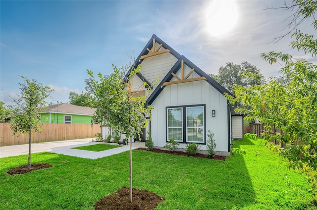8714 Clarington St, Houston, TX 77016 - view of front of house with board and batten siding