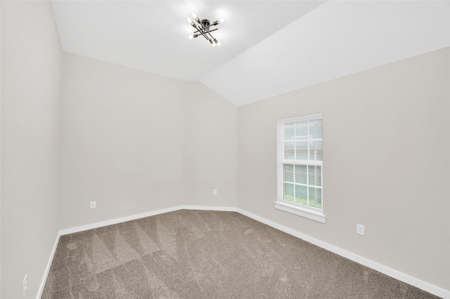 8714 Clarington St, Houston, TX 77016 - carpeted spare room featuring vaulted ceiling and baseboards