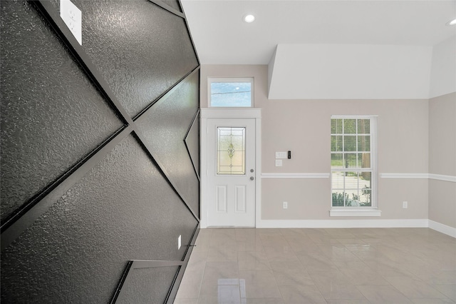 8714 Clarington St, Houston, TX 77016 - foyer entrance with baseboards, healthy amount of natural light, recessed lighting, and tile patterned flooring