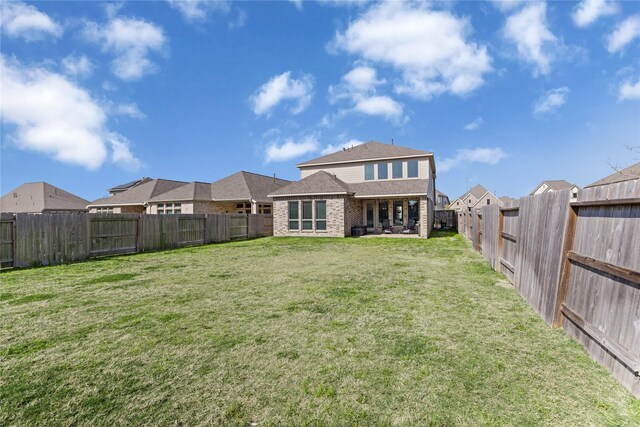 16334 Silver Emperor St, Humble, TX 77346 - back of property with brick siding, a patio, and a residential view