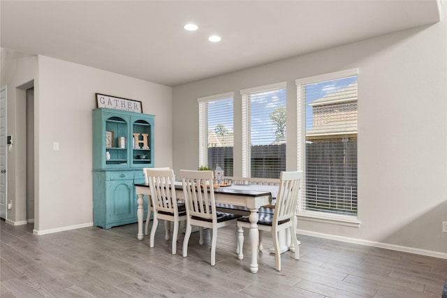 16334 Silver Emperor St, Humble, TX 77346 - dining space with light wood-style flooring, baseboards, and recessed lighting