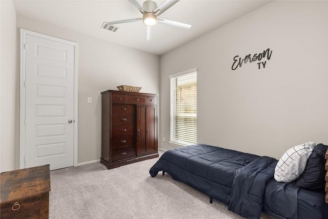 16334 Silver Emperor St, Humble, TX 77346 - bedroom featuring light carpet, ceiling fan, and baseboards