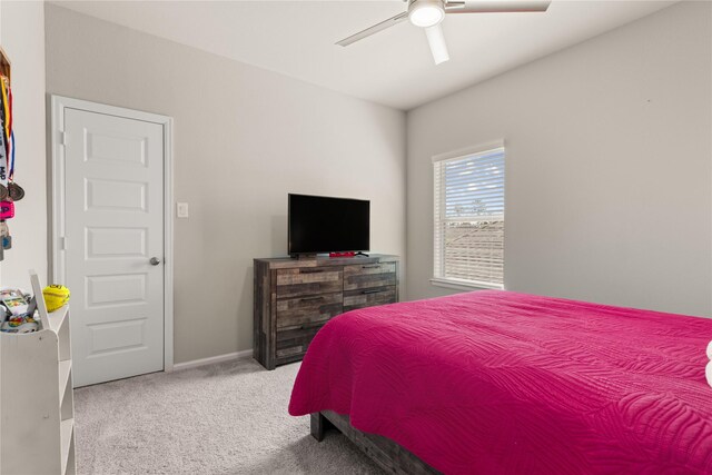 16334 Silver Emperor St, Humble, TX 77346 - carpeted bedroom with a ceiling fan and baseboards