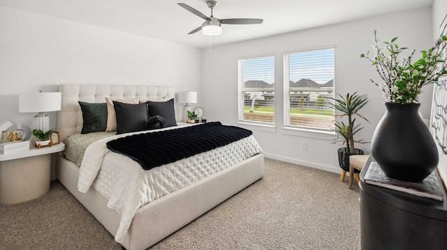 12316 Frisco Cove Ct, Houston, TX 77047 - bedroom with carpet floors, baseboards, and a ceiling fan