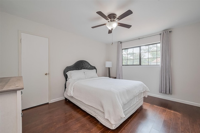 2906 Laurel Fork Dr, Houston, TX 77339 - bedroom featuring wood finished floors, baseboards, and ceiling fan
