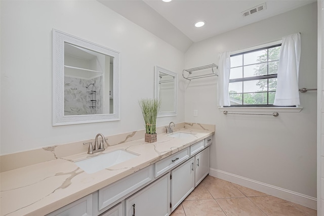 2906 Laurel Fork Dr, Houston, TX 77339 - bathroom featuring double vanity, baseboards, tile patterned floors, and a shower