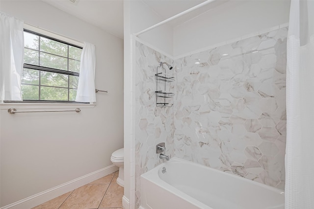 2906 Laurel Fork Dr, Houston, TX 77339 - full bath with shower / bath combo, toilet, tile patterned floors, and baseboards