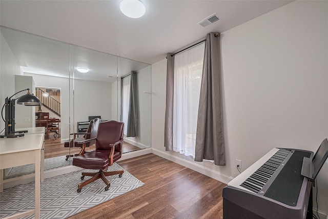 2906 Laurel Fork Dr, Houston, TX 77339 - office area featuring wood finished floors, healthy amount of natural light, baseboards, and heating unit