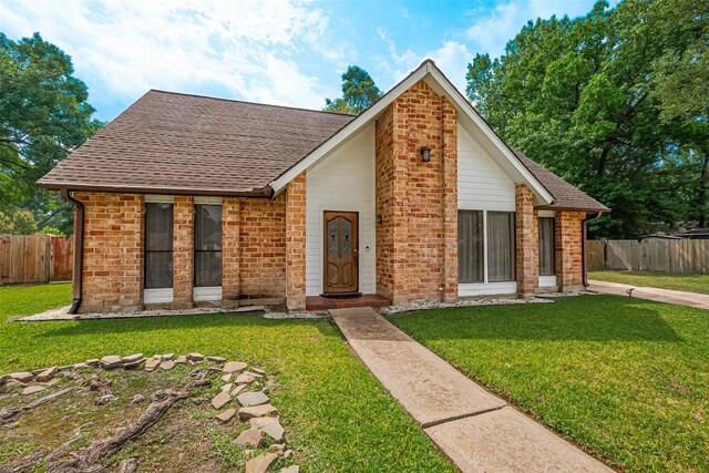 2906 Laurel Fork Dr, Houston, TX 77339 - view of front facade with a shingled roof and brick siding