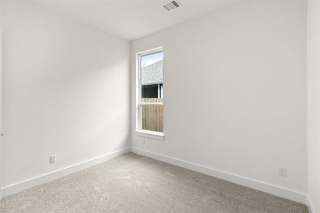 8335 Red Shiner Way, Fulshear, TX 77441 - spare room with light carpet and baseboards