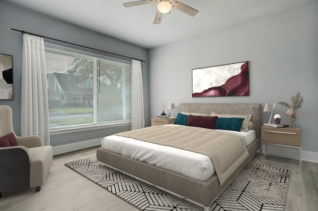 4523 Keystone St, Houston, TX 77021 - bedroom with wood finished floors, baseboards, and ceiling fan