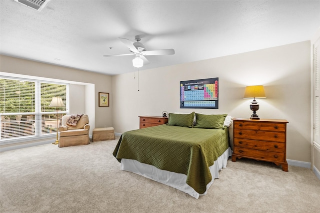 1146 Fountain View Dr Unit 204, Houston, TX 77057 - bedroom with carpet flooring, baseboards, and a ceiling fan