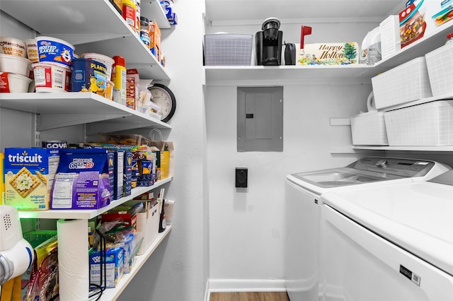 1146 Fountain View Dr Unit 204, Houston, TX 77057 - storage area featuring electric panel and washing machine and clothes dryer