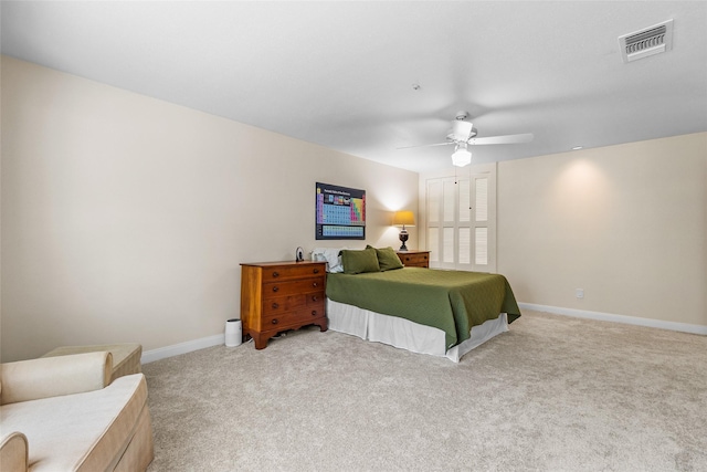 1146 Fountain View Dr Unit 204, Houston, TX 77057 - bedroom featuring light colored carpet, baseboards, and a ceiling fan