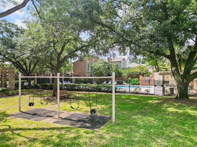 1146 Fountain View Dr Unit 204, Houston, TX 77057 - view of home's community featuring a playground and a swimming pool