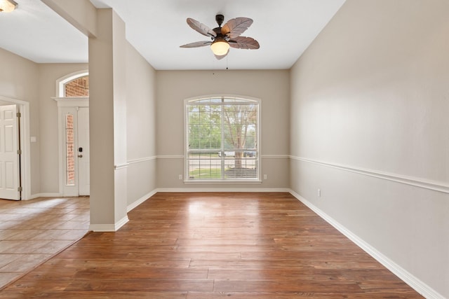 2100 Williams Glen Dr, Bryan, TX 77808 - unfurnished room with wood finished floors, a ceiling fan, and baseboards