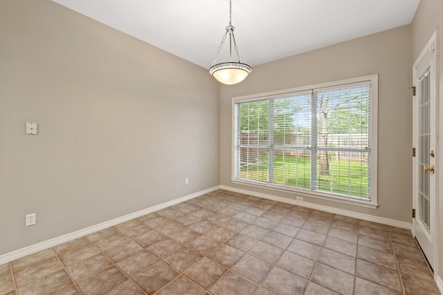 2100 Williams Glen Dr, Bryan, TX 77808 - tiled spare room with baseboards