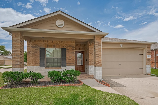 614 Starboard Ct, Katy, TX 77494 - view of front of house with driveway, a garage, brick siding, and a front yard