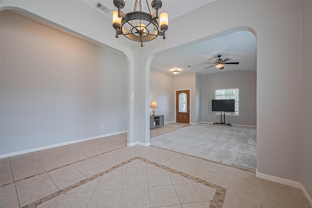 614 Starboard Ct, Katy, TX 77494 - unfurnished room featuring arched walkways, a chandelier, ceiling fan, and baseboards