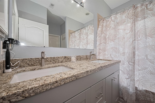 614 Starboard Ct, Katy, TX 77494 - full bathroom featuring double vanity