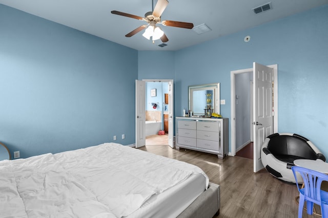 9108 Yellow Cedar Trl, Fort Worth, TX 76244 - bedroom featuring wood finished floors, connected bathroom, ceiling fan, and baseboards