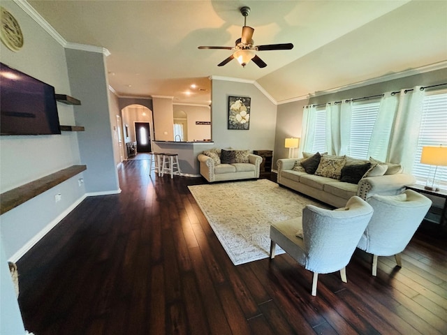 20214 Blue Lake View Ln, Humble, TX 77338 - living area with arched walkways, ornamental molding, dark wood-style flooring, ceiling fan, and vaulted ceiling