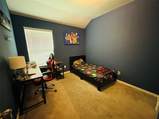 20214 Blue Lake View Ln, Humble, TX 77338 - bedroom featuring lofted ceiling, carpet floors, baseboards, and a desk