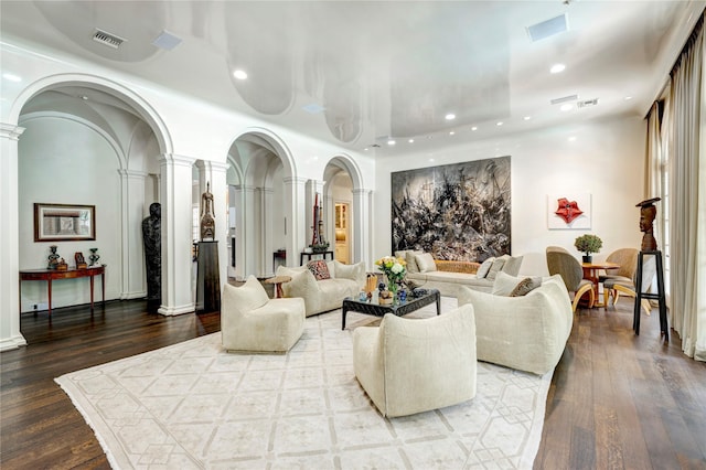 3653 Inverness Dr, Houston, TX 77019 - living area featuring ornate columns, wood finished floors, and recessed lighting