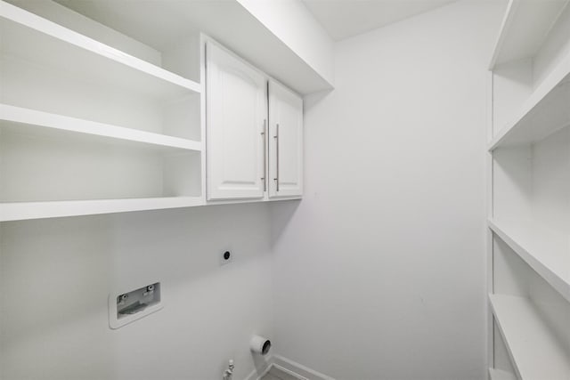 1326 Forest Home Dr, Houston, TX 77077 - laundry room with electric dryer hookup, hookup for a washing machine, cabinet space, and baseboards