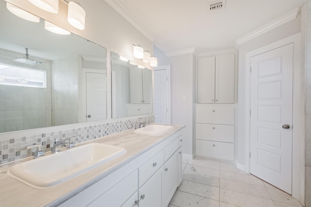 1326 Forest Home Dr, Houston, TX 77077 - bathroom with crown molding, backsplash, and double vanity