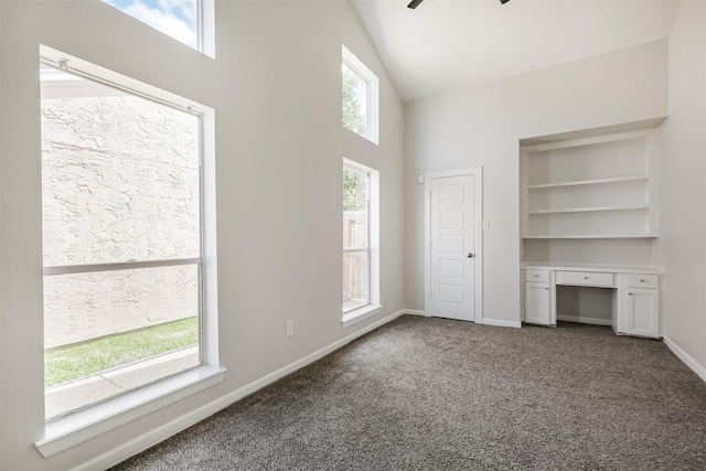 1326 Forest Home Dr, Houston, TX 77077 - unfurnished office featuring high vaulted ceiling, dark colored carpet, baseboards, and a ceiling fan