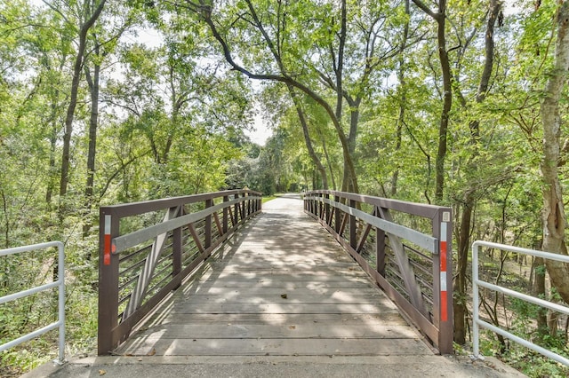 1326 Forest Home Dr, Houston, TX 77077 - surrounding community with a forest view