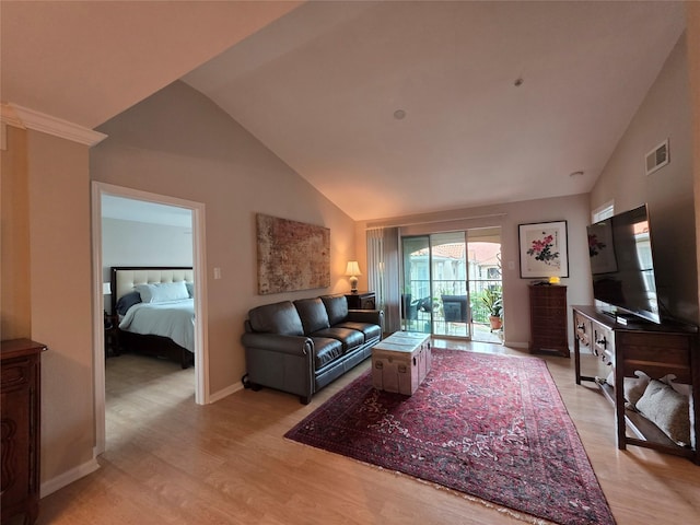 3231 Allen Pkwy Unit 4307, Houston, TX 77019 - living area with vaulted ceiling, light wood-style floors, and baseboards