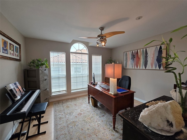 3231 Allen Pkwy Unit 4307, Houston, TX 77019 - office with a ceiling fan, baseboards, and light wood finished floors