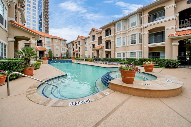 3231 Allen Pkwy Unit 4307, Houston, TX 77019 - community pool featuring a patio area