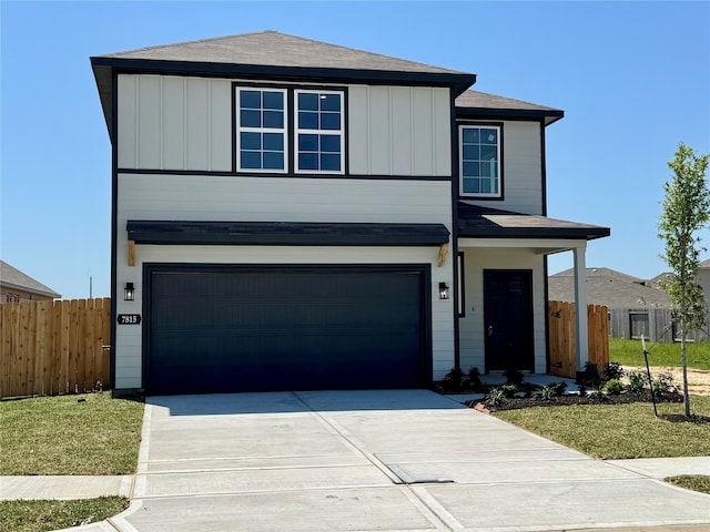 7919 Grand Louis Way, Spring, TX 77379 - view of front of property with an attached garage, board and batten siding, and concrete driveway