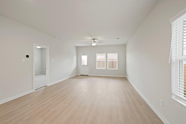 7919 Grand Louis Way, Spring, TX 77379 - spare room featuring a ceiling fan and light wood-type flooring