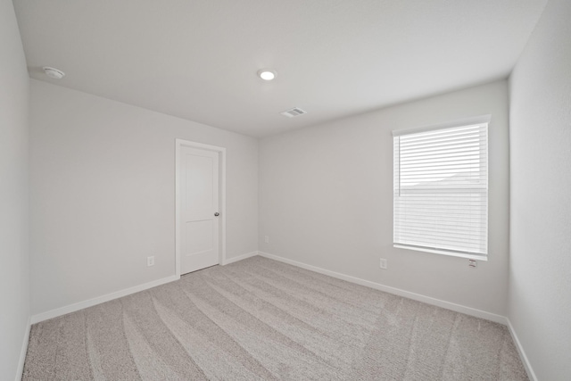 7919 Grand Louis Way, Spring, TX 77379 - carpeted spare room featuring a smoke detector and baseboards