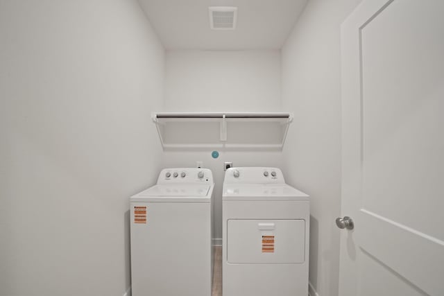 7919 Grand Louis Way, Spring, TX 77379 - washroom featuring washer and clothes dryer