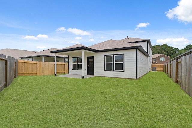 7919 Grand Louis Way, Spring, TX 77379 - rear view of house featuring a fenced backyard, a patio, and a shingled roof