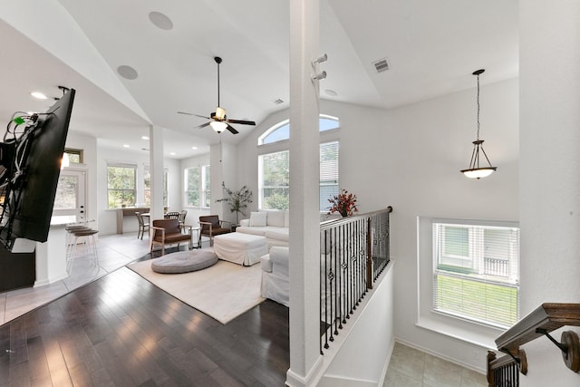 126 Biltmore Loop, Montgomery, TX 77316 - living area with a ceiling fan, light wood-style floors, baseboards, high vaulted ceiling, and recessed lighting