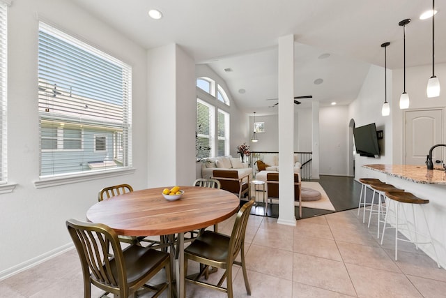 126 Biltmore Loop, Montgomery, TX 77316 - dining space featuring light tile patterned flooring, lofted ceiling, a ceiling fan, baseboards, and recessed lighting