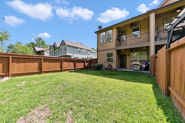 126 Biltmore Loop, Montgomery, TX 77316 - back of property featuring ceiling fan, a balcony, a residential view, and a patio area
