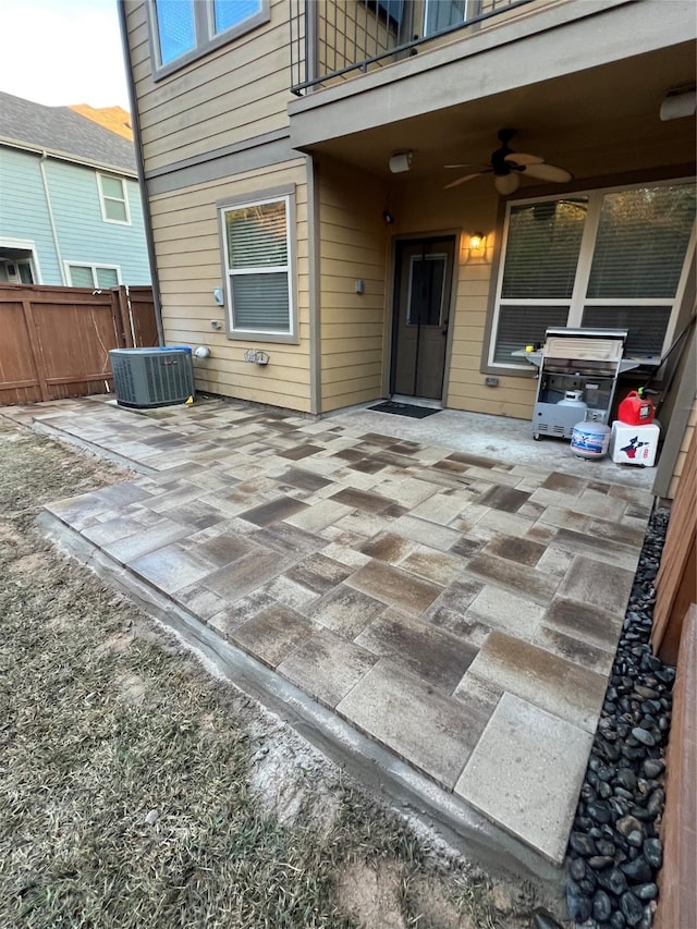 126 Biltmore Loop, Montgomery, TX 77316 - view of patio / terrace with ceiling fan, cooling unit, a balcony, and a grill