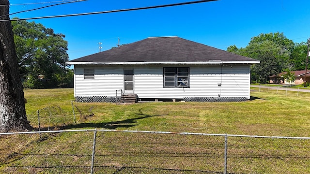 270 S 9th St, Silsbee, TX 77656 - rear view of property with entry steps and a shingled roof