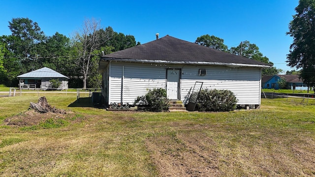 270 S 9th St, Silsbee, TX 77656 - view of side of property with entry steps, a lawn, and cooling unit