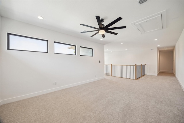 403 Venado View Ct, Conroe, TX 77304 - unfurnished room with attic access, a ceiling fan, light colored carpet, recessed lighting, and baseboards