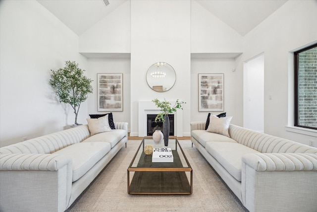 403 Venado View Ct, Conroe, TX 77304 - living area featuring a glass covered fireplace and high vaulted ceiling