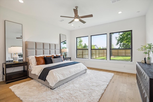 403 Venado View Ct, Conroe, TX 77304 - bedroom featuring light wood-type flooring, recessed lighting, baseboards, and ceiling fan